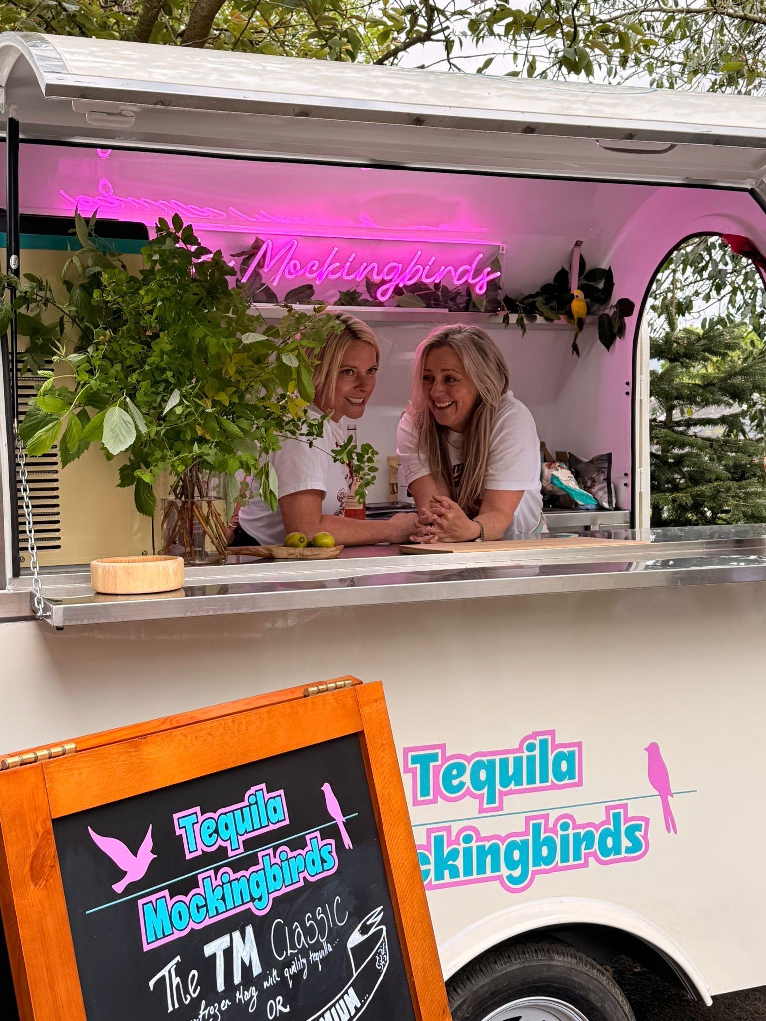 Professional bartender preparing a signature frozen margarita at a Tequila Mockingbirds event